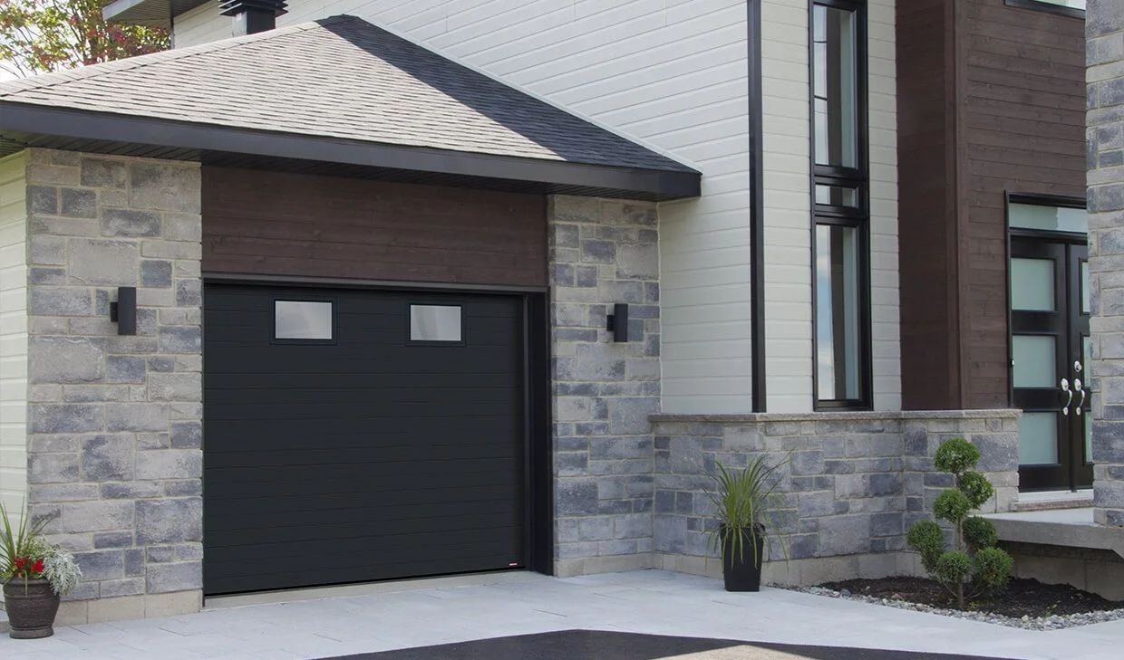 Vous trouverez ici les détails les plus pertinents de notre Porte de garage contemporaine Longueuil